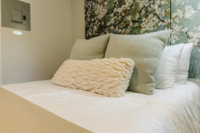 Centrally Located Memphis Tiny Home Queen Bed REAR